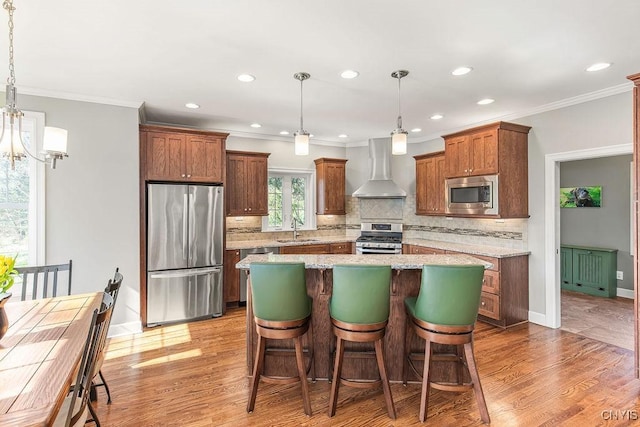 3830 Rippleton Rd, Cazenovia, NY 13035 - kitchen with ornamental molding, wall chimney range hood, a sink, appliances with stainless steel finishes, and backsplash