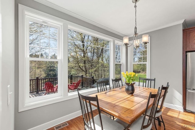 3830 Rippleton Rd, Cazenovia, NY 13035 - dining room with light wood-style floors, baseboards, visible vents, and a chandelier