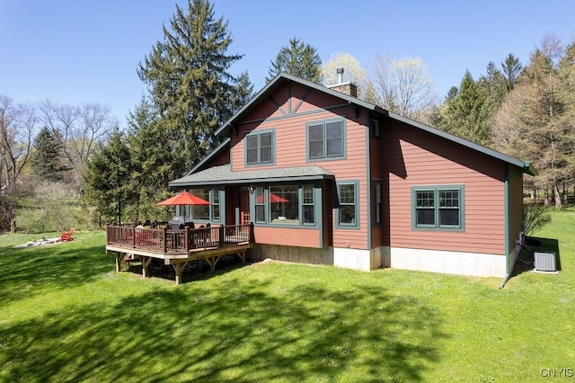3830 Rippleton Rd, Cazenovia, NY 13035 - rear view of property featuring a wooden deck, a chimney, and a yard