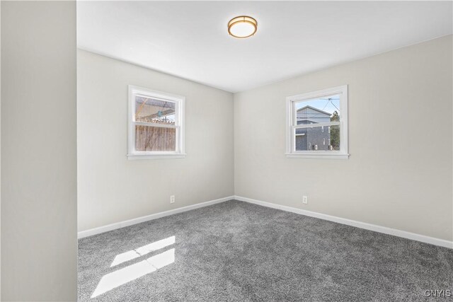 407 Montrose Ave, Geddes, NY 13219 - carpeted spare room with baseboards