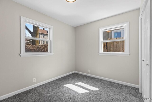 407 Montrose Ave, Geddes, NY 13219 - unfurnished bedroom with baseboards and carpet