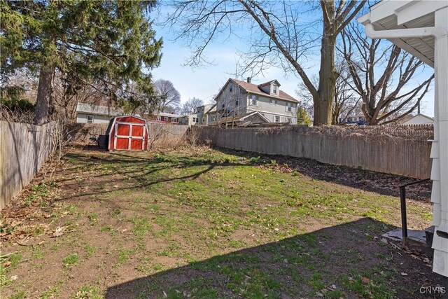 407 Montrose Ave, Geddes, NY 13219 - view of yard featuring a storage shed, an outbuilding, and a fenced backyard