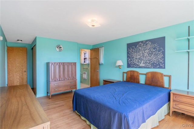 bedroom with wood finished floors