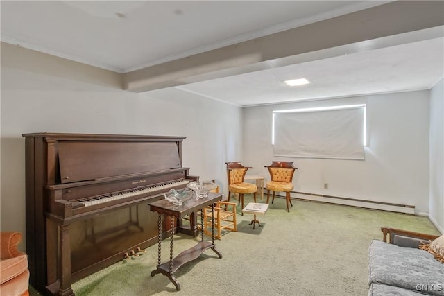 sitting room with crown molding, carpet floors, baseboards, and a baseboard heating unit