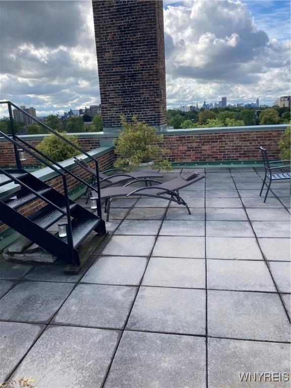 731 W Fry Unit 7G, Buffalo, NY 14222 - view of patio / terrace featuring stairway