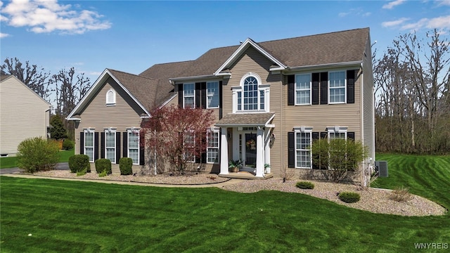 view of front facade featuring a front yard