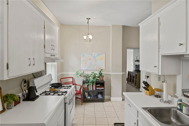 kitchen featuring white cabinets, a sink, light countertops, under cabinet range hood, and white range with gas cooktop