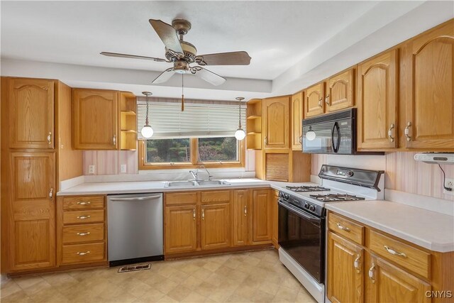 kitchen featuring stainless steel dishwasher, open shelves, black microwave, range with gas cooktop, and a sink