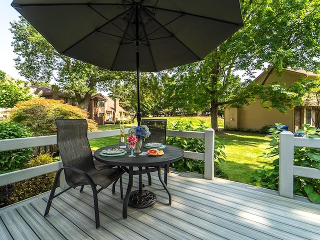deck featuring a yard