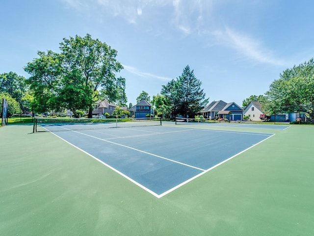 view of sport court featuring fence and community basketball court