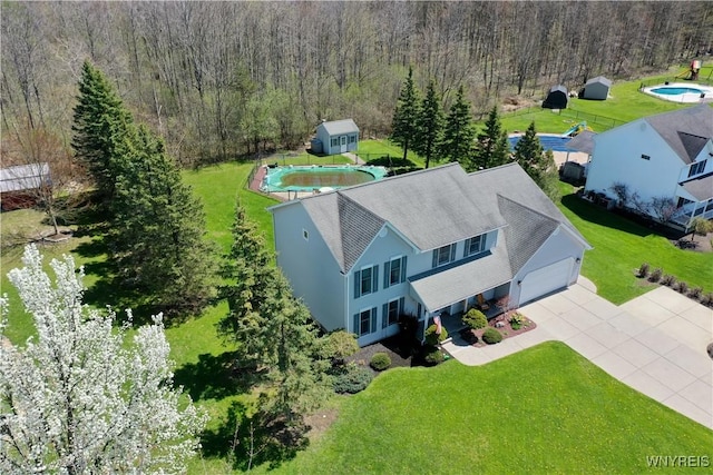 drone / aerial view with a forest view