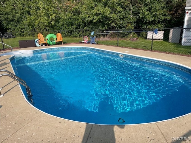 view of pool with fence and a fenced in pool