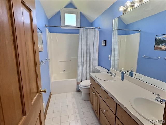 bathroom featuring a sink, vaulted ceiling, toilet, and shower / bath combo
