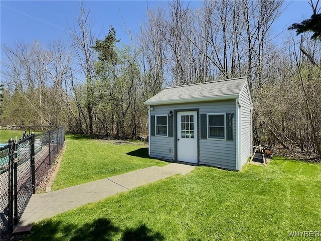 view of outdoor structure with an outdoor structure and fence