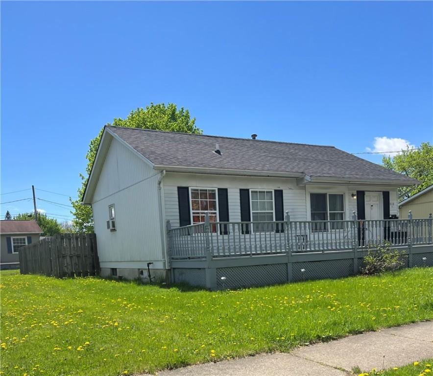 510 Harper St, Elmira-City, NY 14901 - ranch-style house with fence, a wooden deck, a shingled roof, and a front lawn