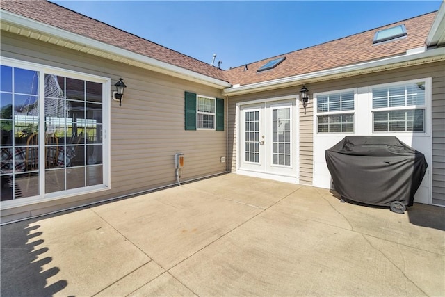 view of patio / terrace with french doors and a grill