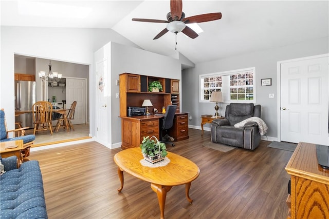 living room with wood finished floors, baseboards, ceiling fan with notable chandelier, and lofted ceiling