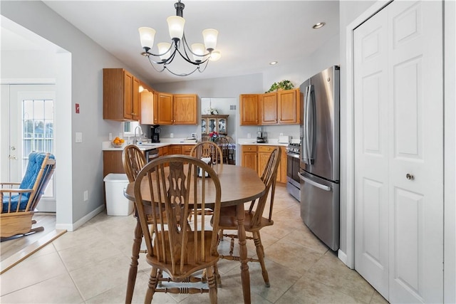 dining room featuring recessed lighting, baseboards, a chandelier, and light tile patterned floors