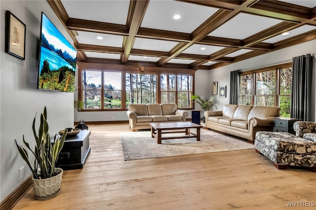 living room with beam ceiling, light wood finished floors, recessed lighting, baseboards, and coffered ceiling