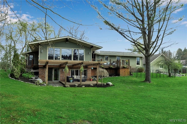 back of property featuring brick siding, a pergola, a yard, and a patio