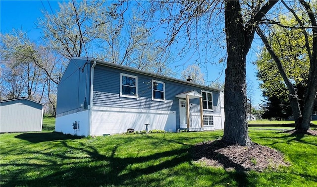 71 Redwing Ln, Horseheads, NY 14845 - bi-level home featuring an outbuilding and a front lawn