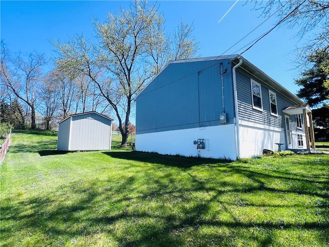 71 Redwing Ln, Horseheads, NY 14845 - view of side of home with a lawn, an outdoor structure, and a shed