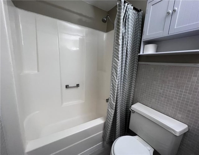 71 Redwing Ln, Horseheads, NY 14845 - bathroom with toilet, tile walls, and shower / tub combo with curtain