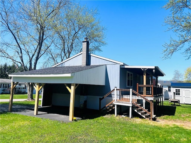 71 Redwing Ln, Horseheads, NY 14845 - view of side of property with a storage unit, stairway, a chimney, a lawn, and an outdoor structure