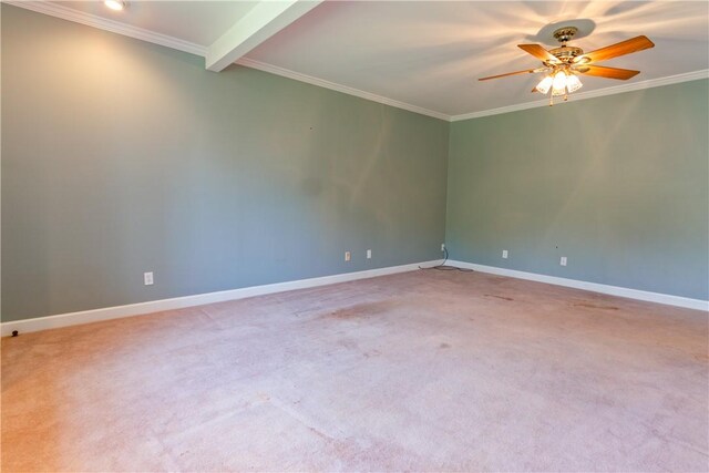 carpeted spare room featuring baseboards, a ceiling fan, and ornamental molding