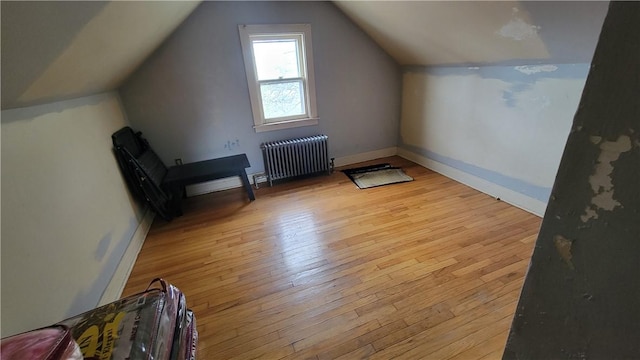 147 Roswell Ave, Tonawanda-Town, NY 14207 - bonus room featuring radiator, baseboards, wood-type flooring, and lofted ceiling