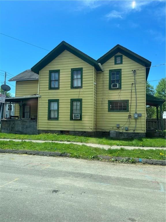 view of home's exterior featuring cooling unit and crawl space