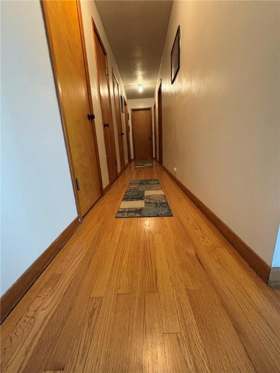 1001 W Broad St, Horseheads, NY 14845 - hall featuring baseboards and light wood finished floors