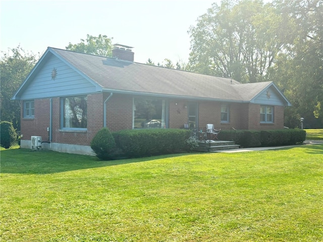 1001 W Broad St, Horseheads, NY 14845 - ranch-style home featuring a chimney, a front lawn, and brick siding