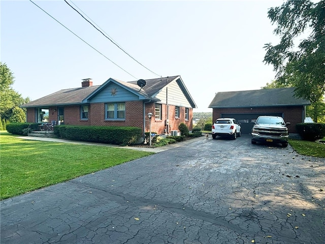 1001 W Broad St, Horseheads, NY 14845 - view of home's exterior with a chimney, a garage, brick siding, aphalt driveway, and a yard
