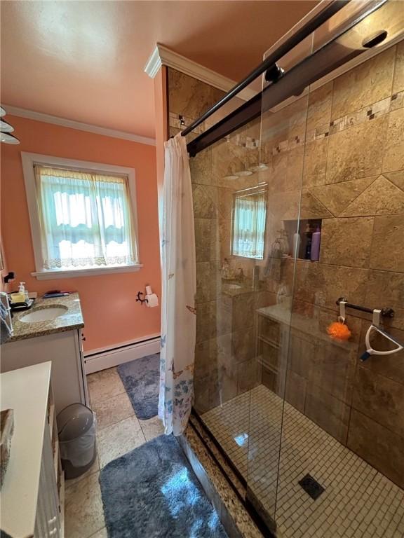 1001 W Broad St, Horseheads, NY 14845 - bathroom featuring vanity, crown molding, a shower stall, and a baseboard radiator