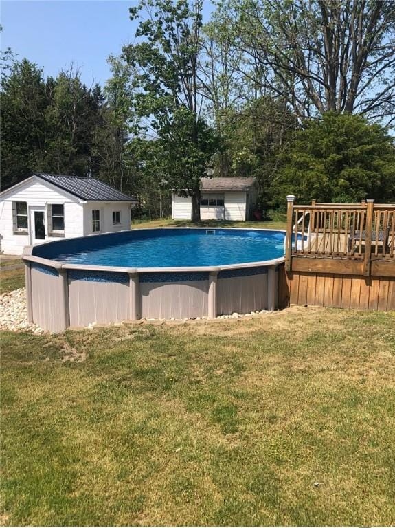1001 W Broad St, Horseheads, NY 14845 - pool featuring a lawn and a deck