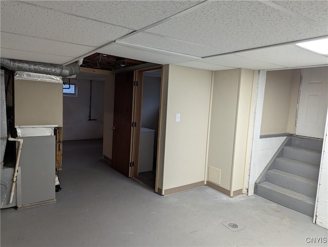 134 Malden Rd, Salina, NY 13211 - finished below grade area featuring heating unit, stairs, and a paneled ceiling
