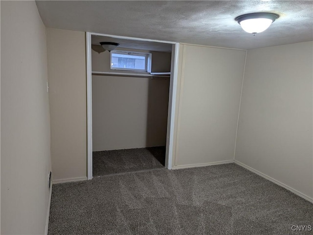 134 Malden Rd, Salina, NY 13211 - unfurnished bedroom featuring carpet floors, a closet, and a textured ceiling