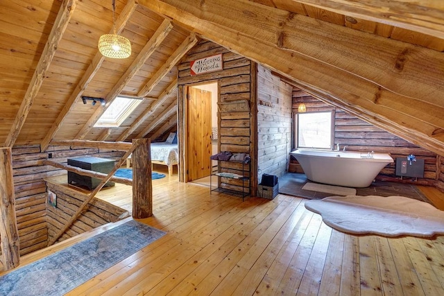 851 Lower Meeker Hollow Rd, Roxbury, NY 12474 - attic featuring a skylight and an upstairs landing