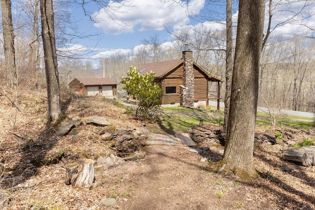 851 Lower Meeker Hollow Rd, Roxbury, NY 12474 - view of front facade featuring log exterior and a chimney