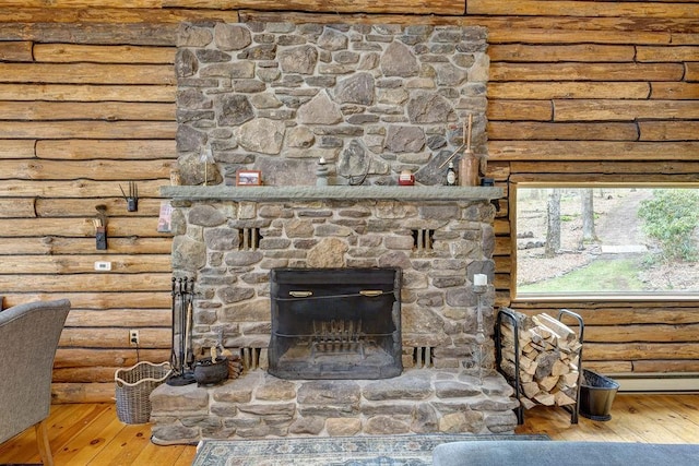 851 Lower Meeker Hollow Rd, Roxbury, NY 12474 - interior details with a fireplace, rustic walls, and wood finished floors
