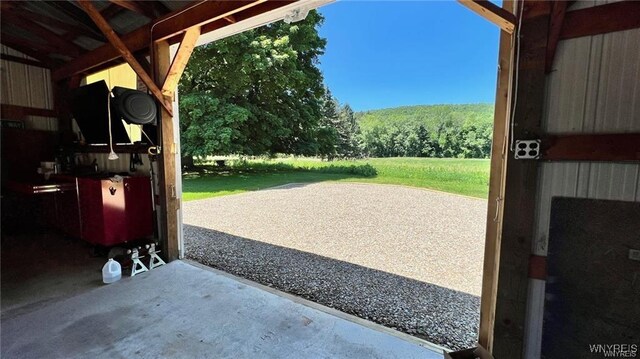 3319 Riverside Dr, Scio, NY 14895 - view of patio / terrace featuring a forest view