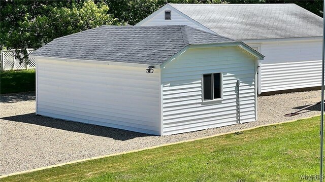 3319 Riverside Dr, Scio, NY 14895 - view of side of home featuring a lawn and a shingled roof
