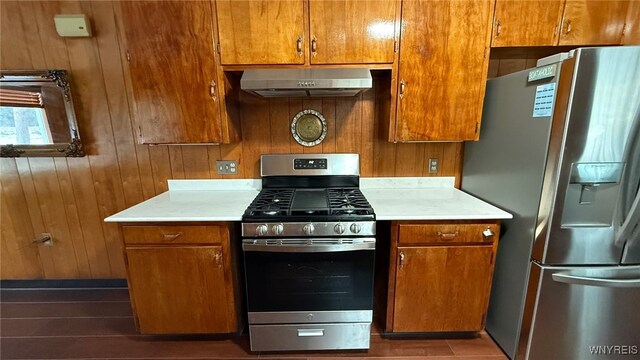3319 Riverside Dr, Scio, NY 14895 - kitchen featuring light countertops, appliances with stainless steel finishes, under cabinet range hood, and brown cabinets