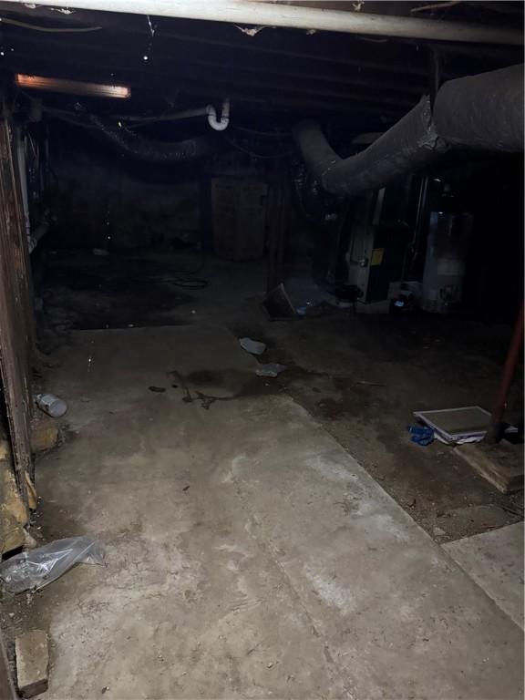 basement with heating unit and crawl space