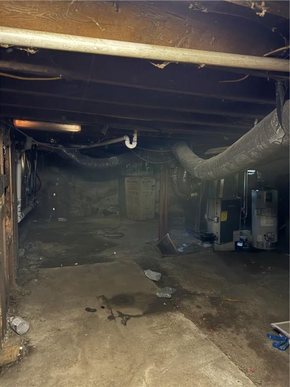 below grade area with heating unit and water heater
