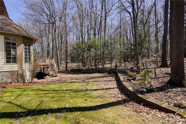 view of yard featuring stairway