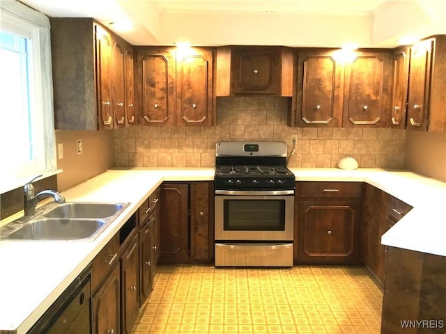 kitchen featuring decorative backsplash, stainless steel gas stove, dishwasher, a sink, and light countertops