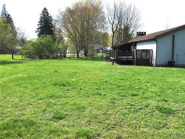 view of yard with a deck