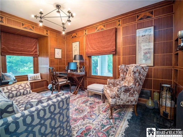 interior space with carpet floors, a notable chandelier, and a wealth of natural light